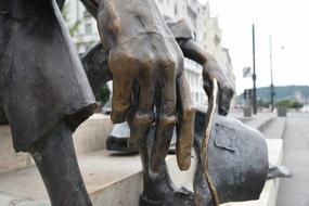 arm of the iron statue