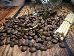 scattered coffee beans from a can