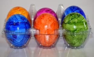 colorful eggs in a plastic box