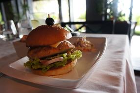 delicious burger with beef and lettuce leaf