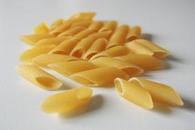 dry noodles on a white table