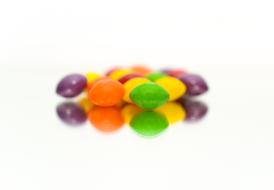 colored sugar candies on a white background