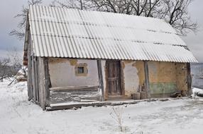 Wood House Abandoned at winter