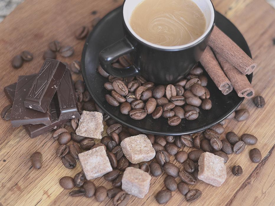 hot coffee sprinkled with beans
