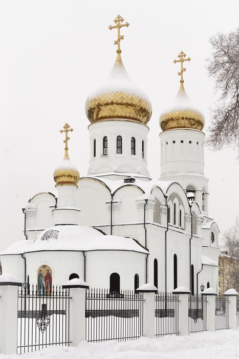 white church with gold domes