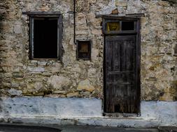 wooden door in a stone wall