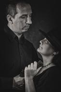 man and woman in black