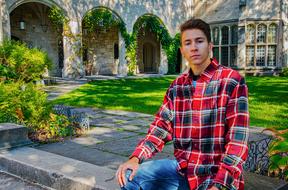 Young Man at House Arch Ways