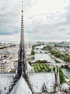 river by the city and the iron tower