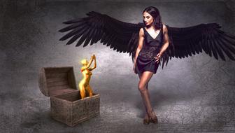 the girl with the black wings with the gold sculpture