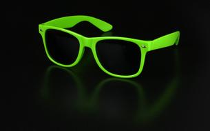 green plastic glasses in black