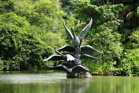 Statue of Geese in pond