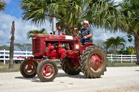 Farmer Shifting Tractor