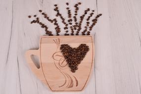 wooden base with coffee beans