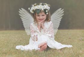 cute girl dressed as an angel