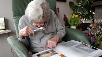 an old woman with a book