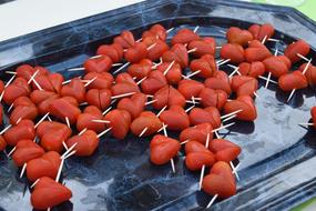 Sliced tomatoes in the form of grilled hearts
