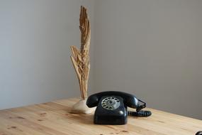retro telephone and decoration on wood table