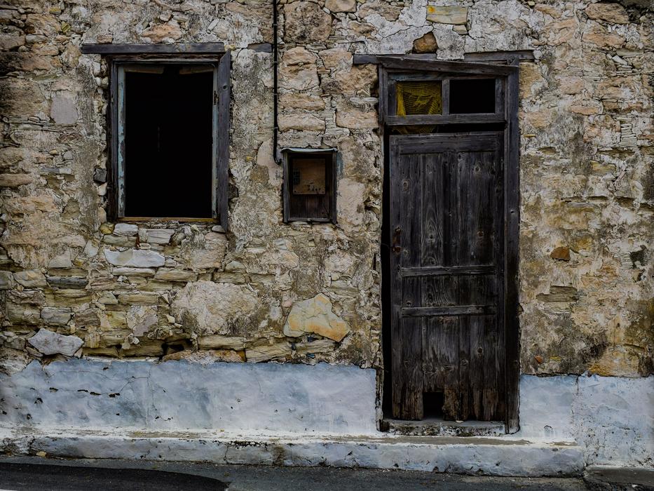 wooden door in a stone wall