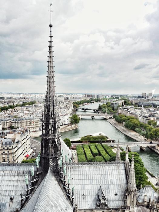 river by the city and the iron tower