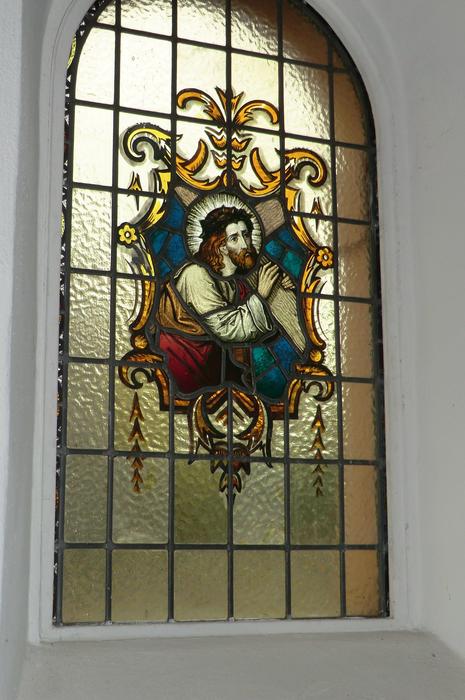 a colored painting with golden windows
