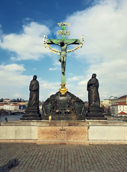 a big green cross on the roof