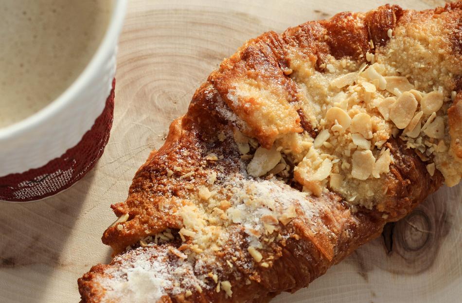 Sweet croissant with hot coffee