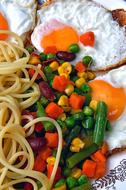Spaghetti with boiled vegetables and egg