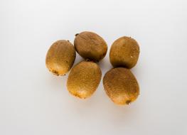 Unpeeled ripe kiwi