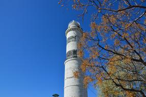 white tower blue background