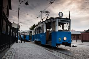 blue train on the tracks