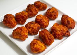 Slices of spicy fried chicken