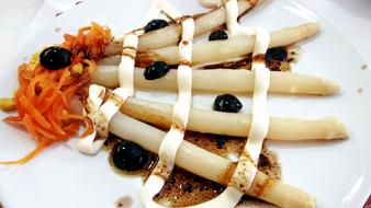 Vegetable dish with ripe olives