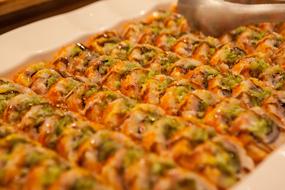fried sushi in sauce