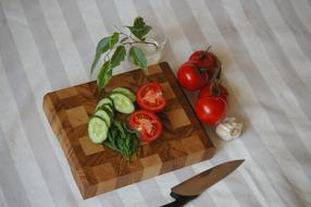 chopped healthy vegetables on a wooden board