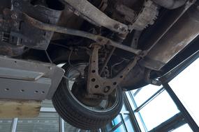 underside inspection of an old car