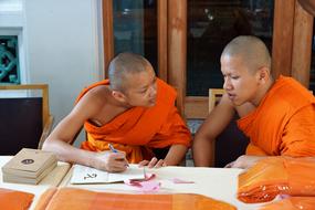 monks drawing a temple