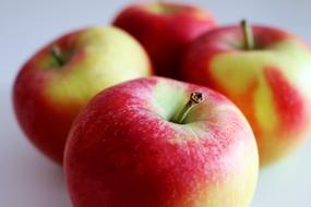 red yellow apples close up blurred background
