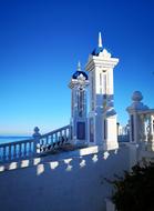 the white bridge is beautiful against the blue background