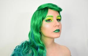 the girl with the green hair and makeup