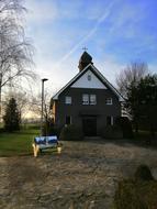 old house with a bench