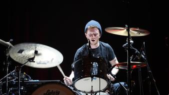 drummer plays at a concert