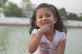 happy child by the water
