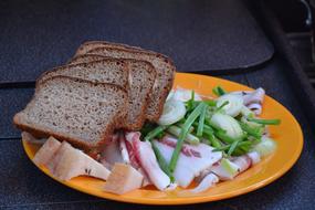 Salted meat with vegetables and bread