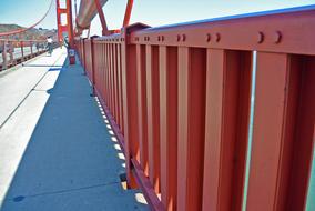 red bridge with shadow