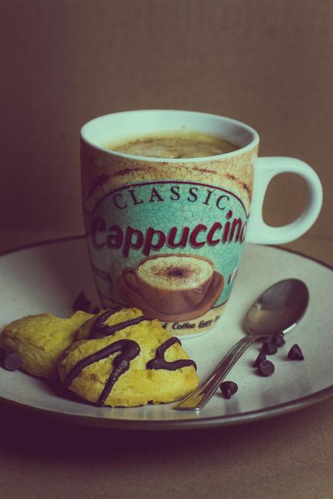 hot aromatic coffee with cookies