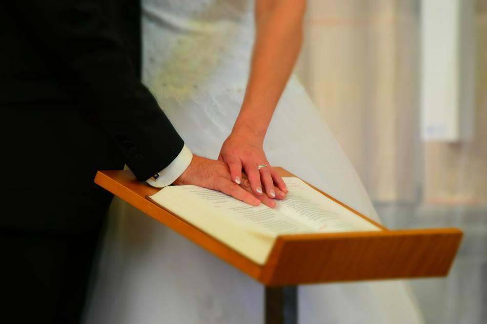 a man and a woman at a paper wedding
