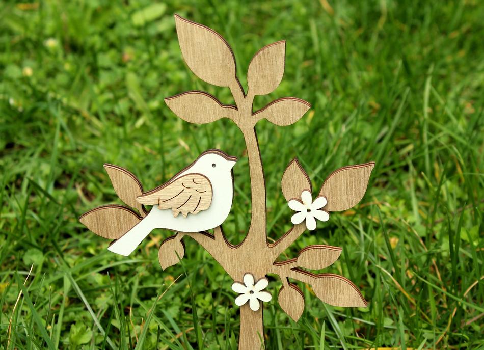 wood clipping of a fake bird