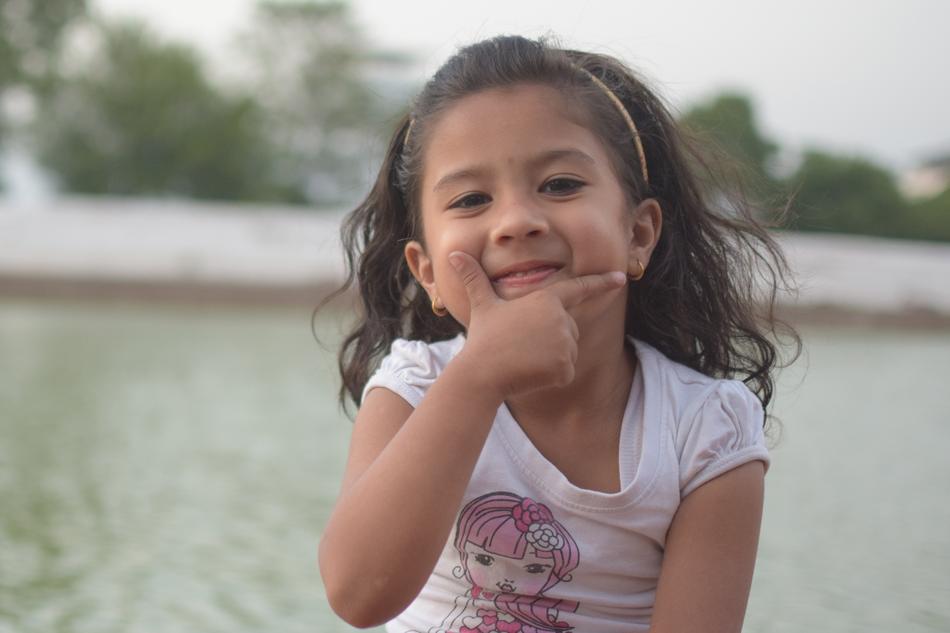 happy child by the water