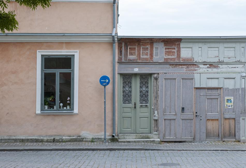 blue sign outside the house